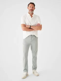 Faherty Movement™ Short-Sleeve Polo: White -Selected Fashion Clothing Stores SP23 faherty mens MKC0115 WHT SS MOVEMENT POLO WHITE B front 1 1000x 46296.1679341087
